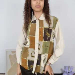 Front view of a vintage beige and multicolour print blouse.